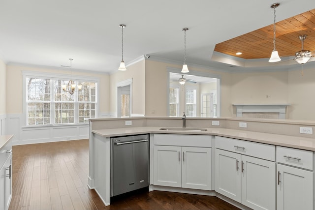 kitchen with white cabinetry, dishwasher, sink, and pendant lighting