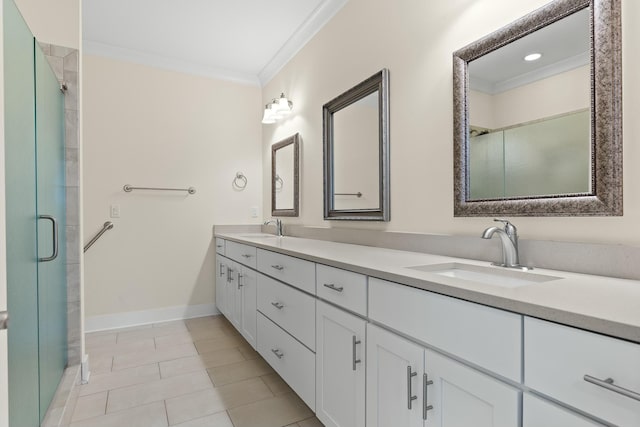 bathroom with vanity, an enclosed shower, crown molding, and tile patterned floors