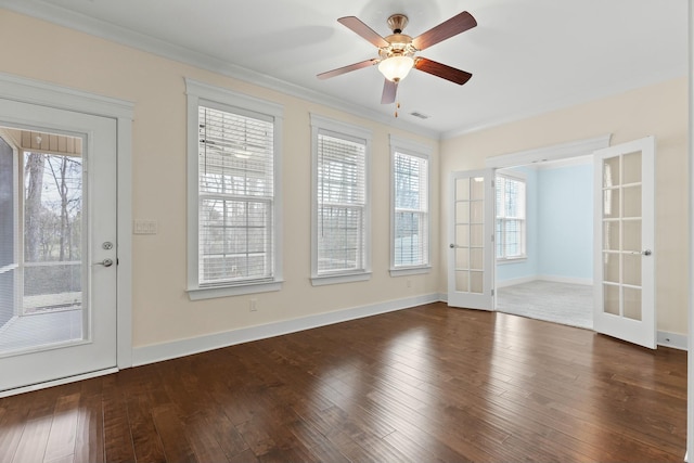 interior space featuring french doors, ceiling fan, crown molding, and dark hardwood / wood-style flooring