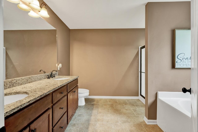 1851 Preservation Dr NE, Cleveland, TN 37323 - full bath with baseboards, a bath, double vanity, and toilet