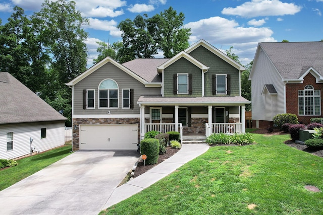 1851 Preservation Dr NE, Cleveland, TN 37323 - craftsman inspired home featuring stone siding, covered porch, concrete driveway, and a front yard