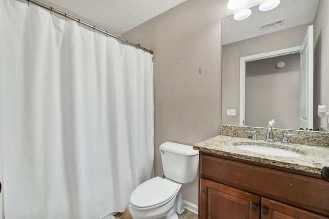 1851 Preservation Dr NE, Cleveland, TN 37323 - bathroom featuring toilet, vanity, and baseboards