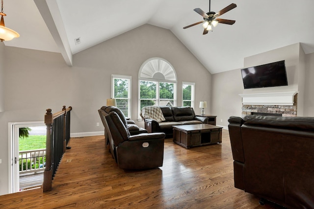 1851 Preservation Dr NE, Cleveland, TN 37323 - living room featuring a ceiling fan, healthy amount of natural light, wood finished floors, high vaulted ceiling, and a fireplace