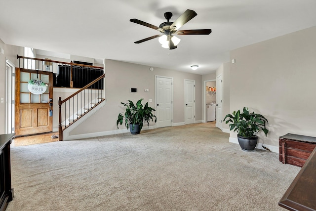 1851 Preservation Dr NE, Cleveland, TN 37323 - entryway featuring carpet flooring, stairway, a ceiling fan, and separate washer and dryer