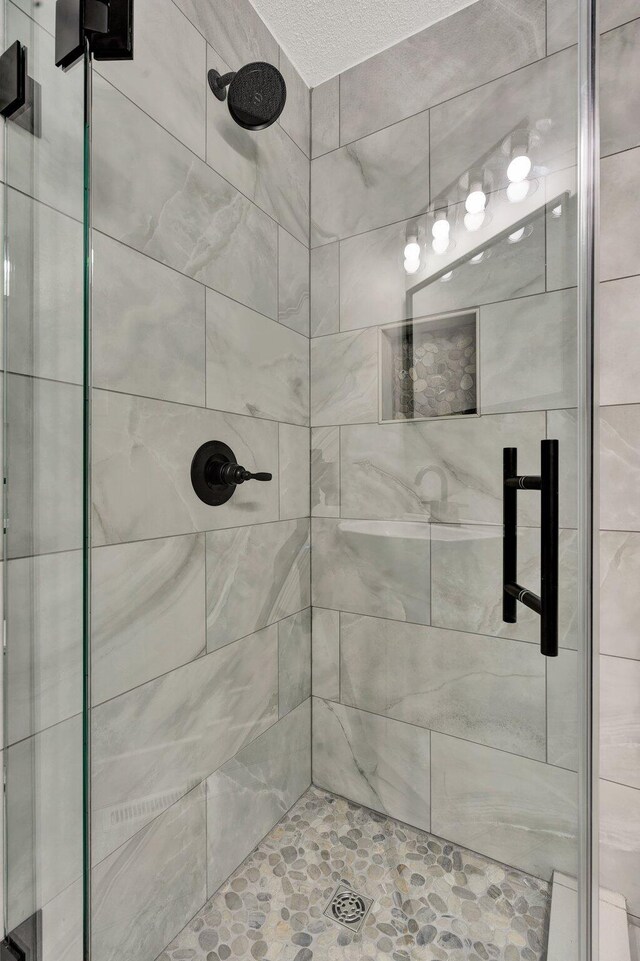 bathroom with a stall shower