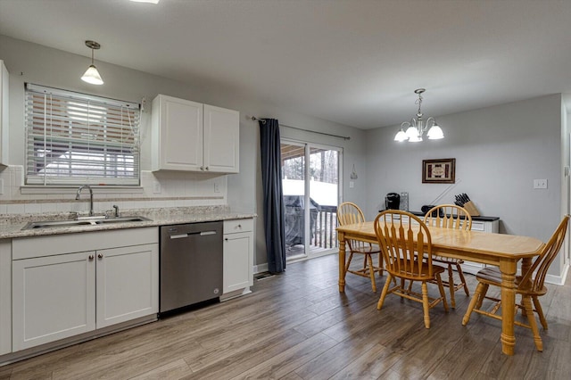 kitchen with white cabinetry, sink, stainless steel appliances, and dark hardwood / wood-style floors