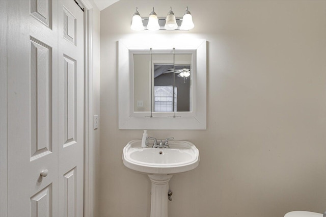 bathroom with tile patterned floors and vanity