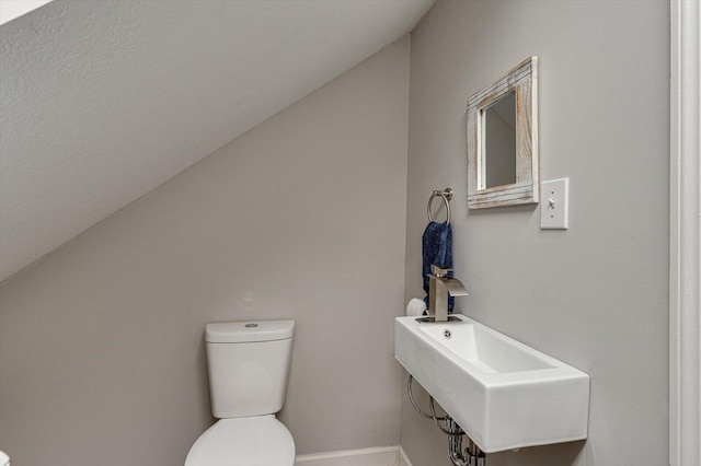 bathroom with tile patterned floors, vanity, and toilet