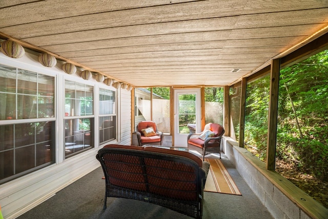 sunroom with wooden ceiling