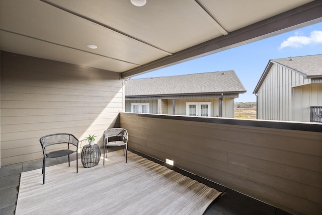 balcony featuring a sunroom