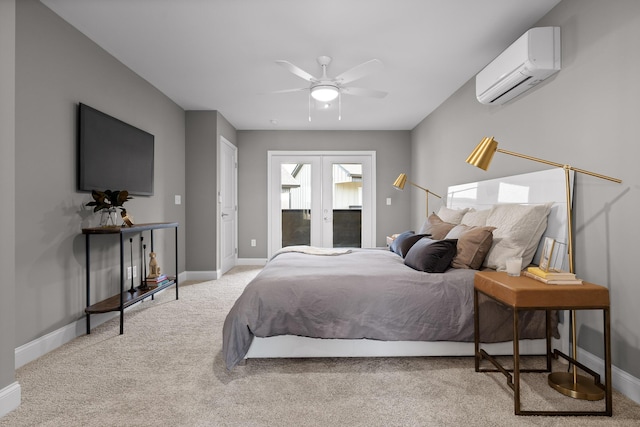 carpeted bedroom featuring baseboards, french doors, and a wall mounted air conditioner