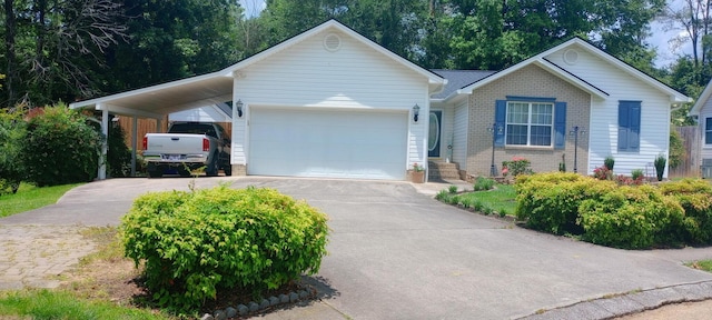 1164 Harvest Glen Dr NW, Cleveland, TN 37312 - ranch-style home with brick siding, concrete driveway, and a garage