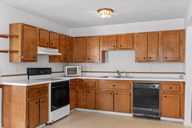 kitchen with electric range oven, a textured ceiling, black dishwasher, and sink