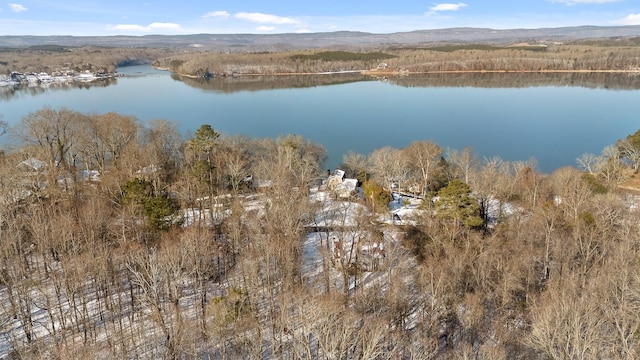 aerial view featuring a water and mountain view