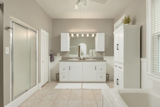 bathroom with ceiling fan, tile patterned floors, vanity, and separate shower and tub