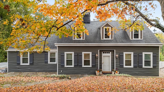 view of new england style home