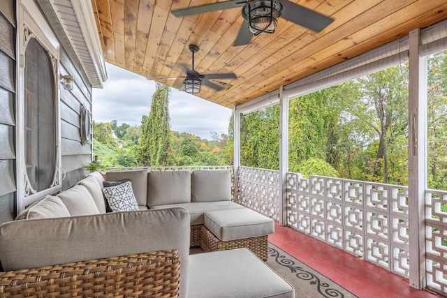 view of patio with ceiling fan and an outdoor living space