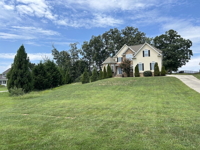 view of front of home with a front yard