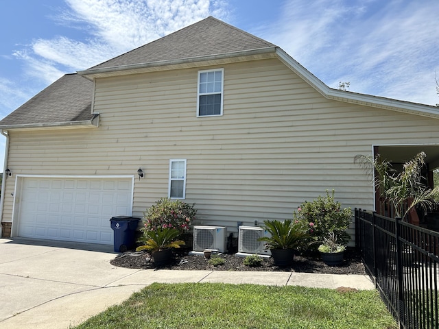 view of property exterior featuring ac unit and central AC