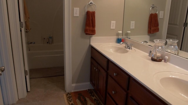 bathroom with bathing tub / shower combination and vanity