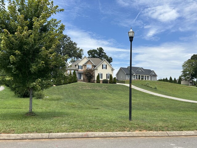 view of front of house with a front lawn