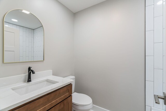 826 Long Mill Rd, Athens, TN 37303 - bathroom featuring toilet, vanity, and baseboards