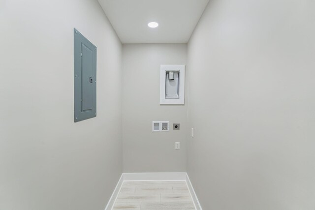 826 Long Mill Rd, Athens, TN 37303 - laundry room featuring electric dryer hookup, electric panel, baseboards, washer hookup, and light marble finish flooring