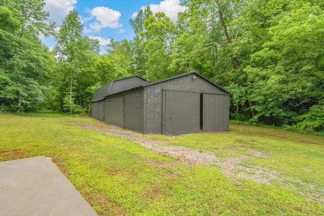 826 Long Mill Rd, Athens, TN 37303 - view of pole building featuring a lawn and a view of trees