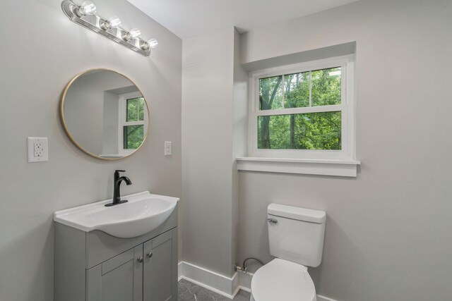 826 Long Mill Rd, Athens, TN 37303 - bathroom with vanity, baseboards, and toilet