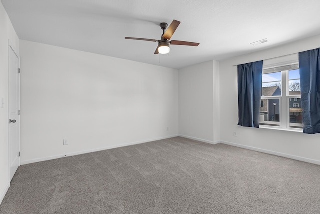 carpeted empty room with ceiling fan