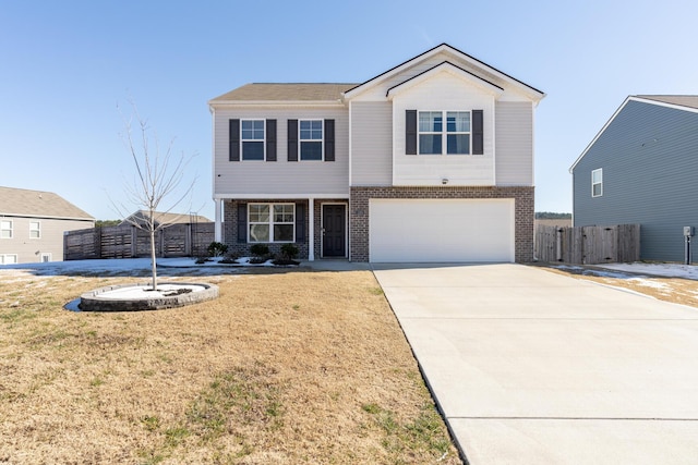 view of front facade featuring a garage and a front lawn