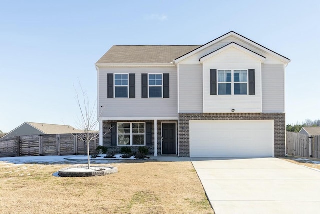 view of front facade with a front lawn and a garage