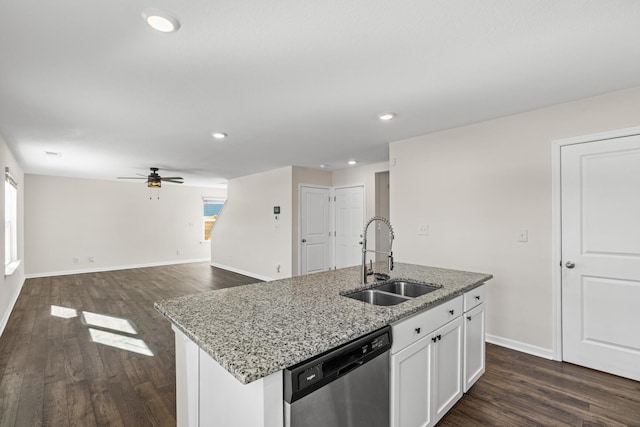 kitchen featuring white cabinets, a kitchen island with sink, ceiling fan, sink, and stainless steel dishwasher