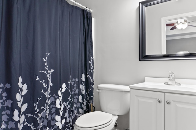 bathroom with vanity, ceiling fan, and toilet