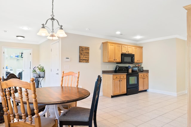 dining space with separate washer and dryer, crown molding, and light tile patterned floors