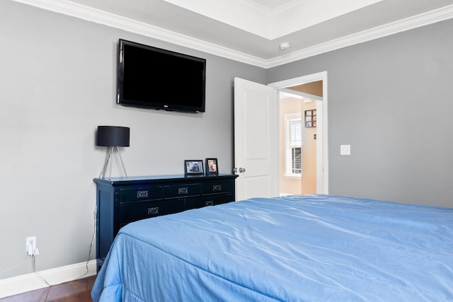 bedroom featuring crown molding