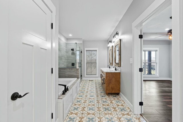 bathroom with separate shower and tub, ceiling fan, vanity, and hardwood / wood-style flooring