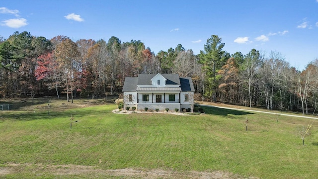 view of front of home featuring a front lawn