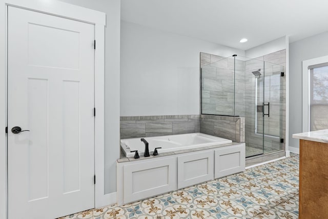 bathroom featuring tile patterned floors and shower with separate bathtub