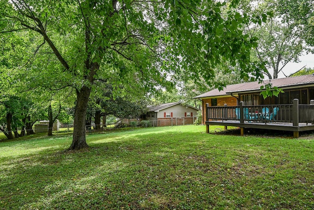 view of yard featuring a wooden deck