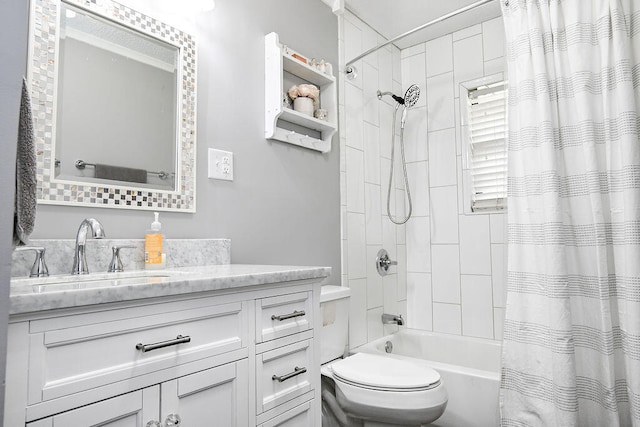 full bathroom featuring vanity, shower / bath combination with curtain, and toilet