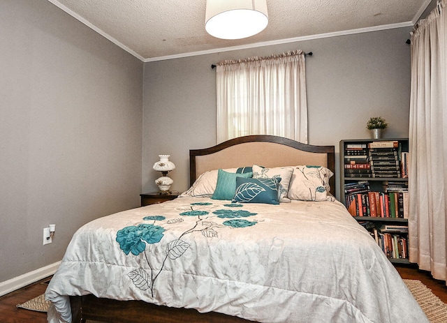 bedroom with a textured ceiling, ornamental molding, and dark wood-type flooring