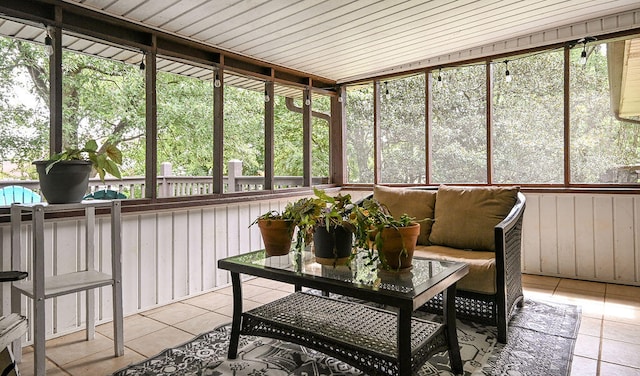 sunroom / solarium with wooden ceiling and a wealth of natural light