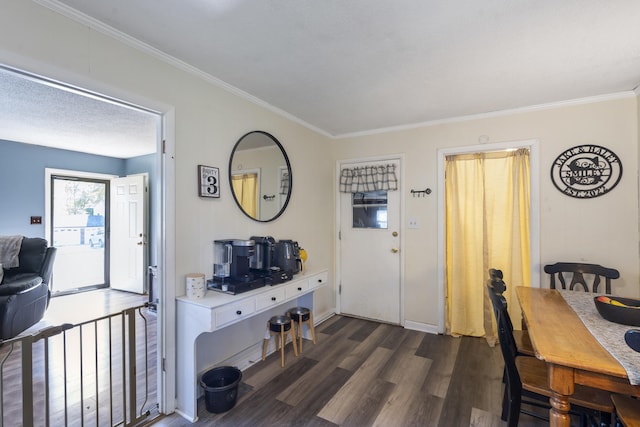 interior space featuring crown molding and dark wood-type flooring