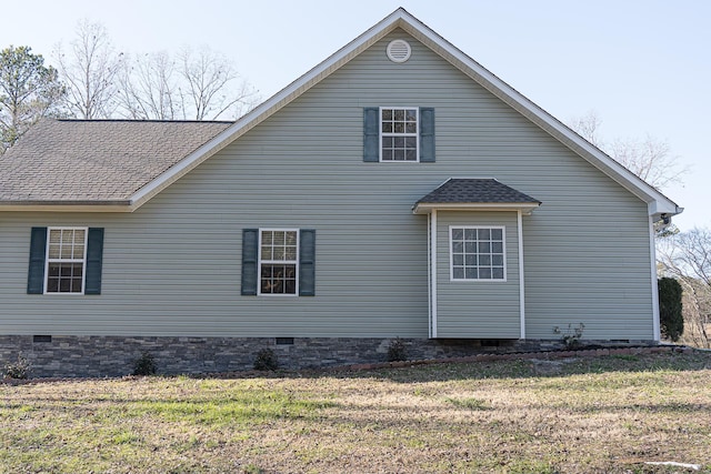 view of home's exterior featuring a lawn