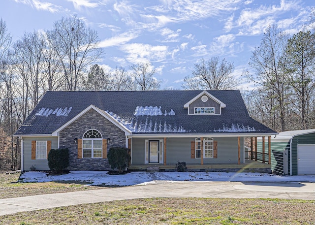 view of front of house with a porch and a carport