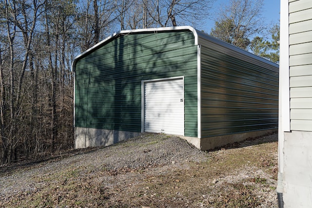 view of outbuilding with a garage