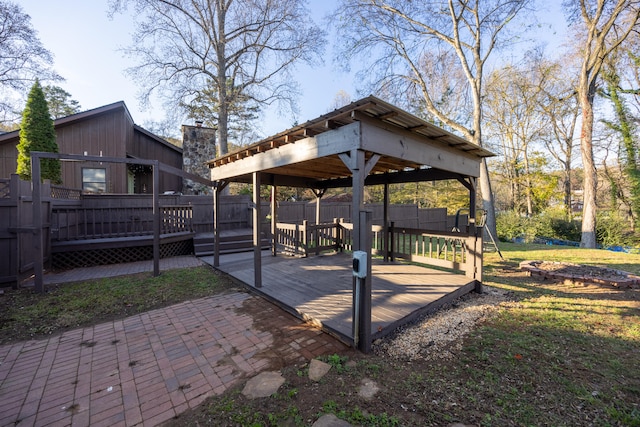 exterior space with a gazebo, a yard, and a wooden deck