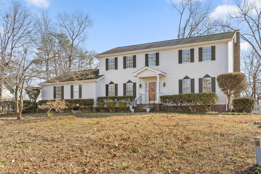 colonial house with a front yard