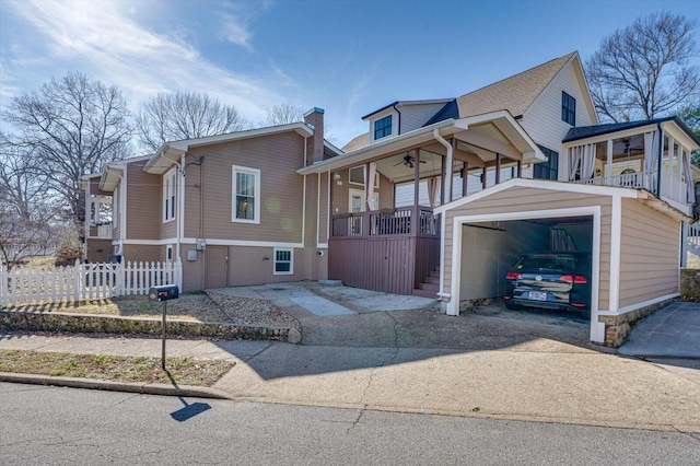 view of front facade with a garage and covered porch